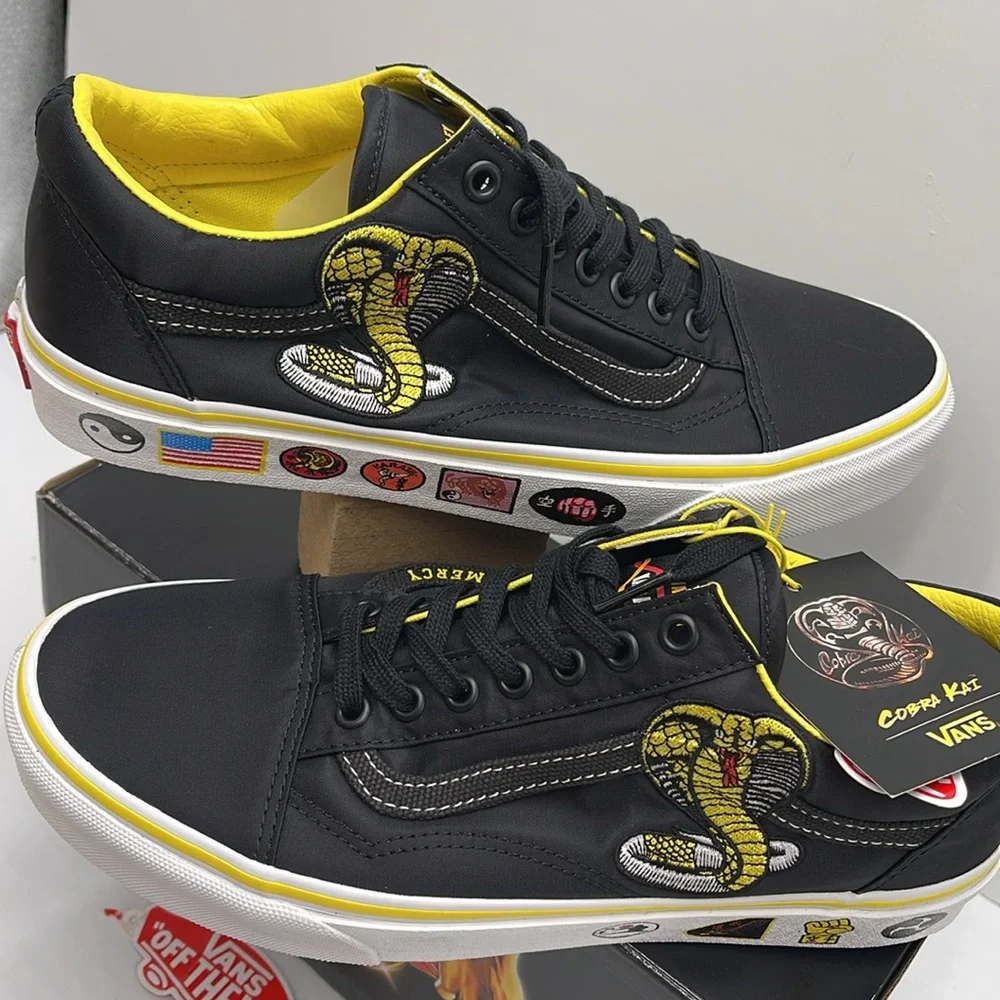 Vans Men’s Old Skool
Cobra Kai Black/Yellow/White 
VN0A3WKT05N
Sneakers - Picture 10 of 16